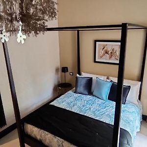 Kamer met een Queen Size Bed